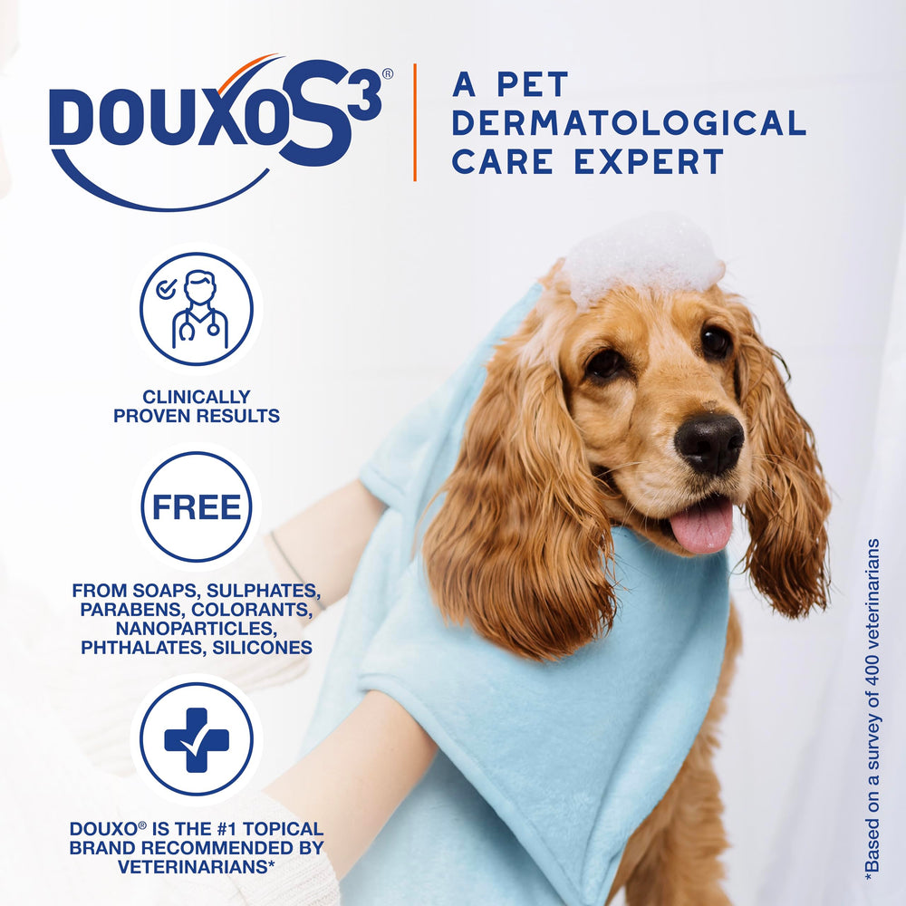 Douxo S3 Pyo Pads application on a cat demonstrates gentle skin care.