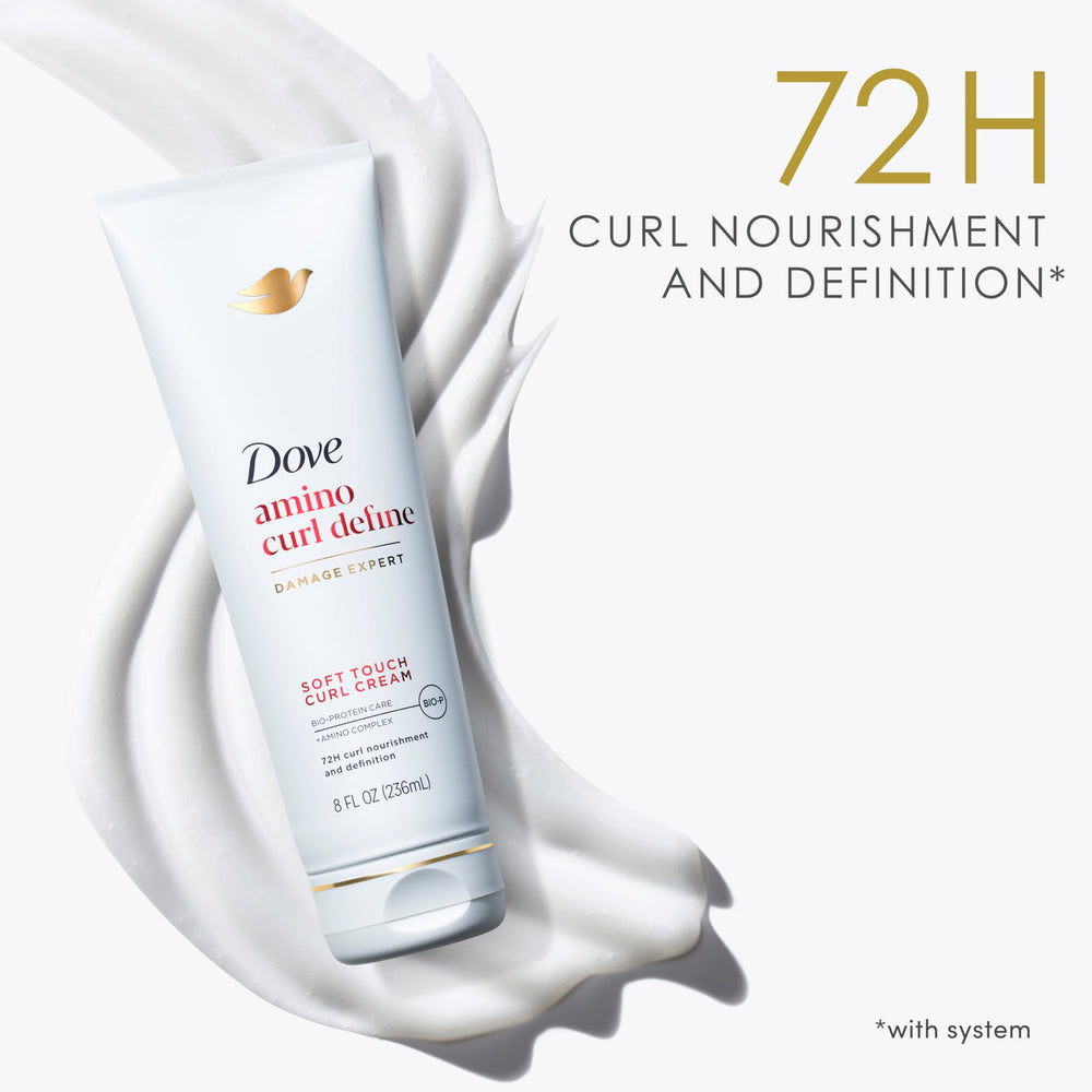 Dove Amino Curl Cream dispensing action captured mid-pump.