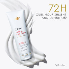 Dove Amino Curl Cream dispensing action captured mid-pump.