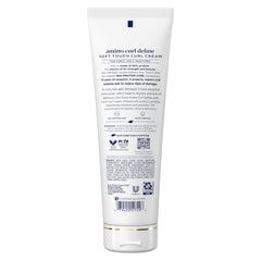 Dove Amino Curl Define Cream texture close-up highlighting smooth formula.
