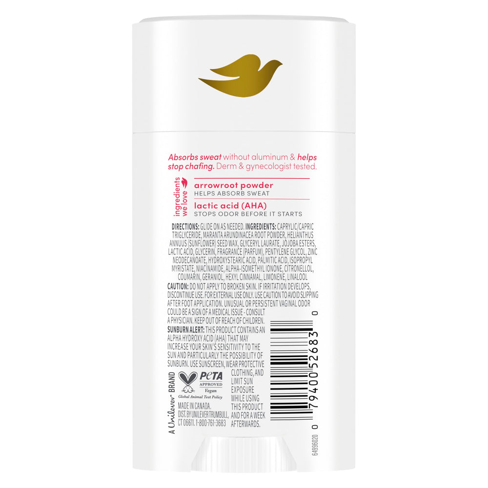 Close-up of applying Dove Berry Blush deodorant stick for quick refreshment.