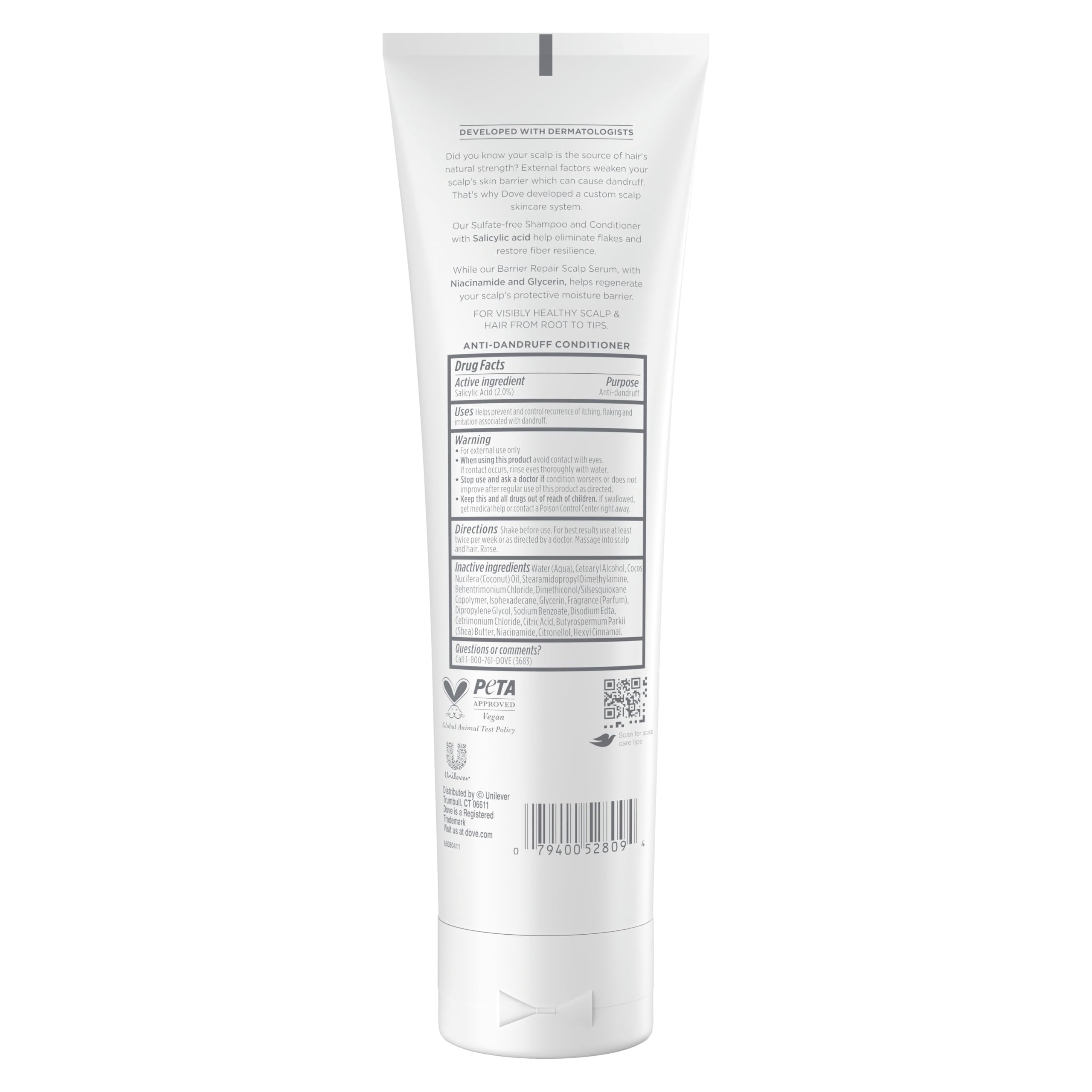 Dove Derma Scalp Conditioner being applied to scalp for gentle flake removal