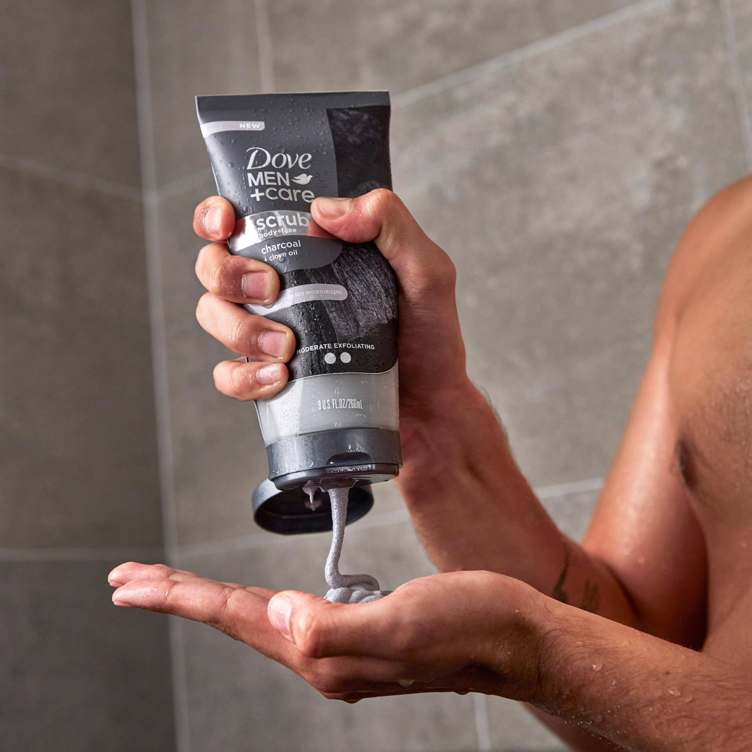 Dove Men+Care charcoal clove scrub natural ingredients close-up.