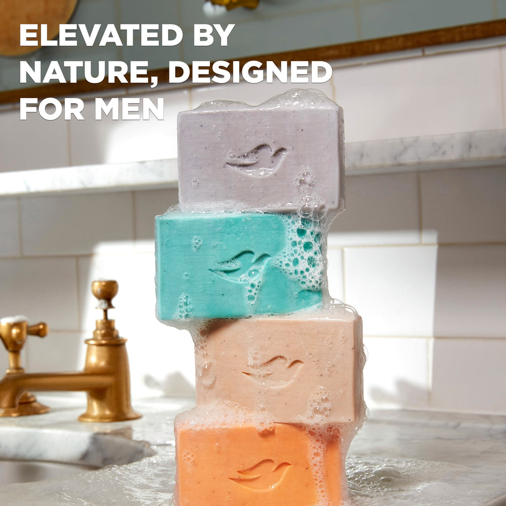 Dove Men+Care cleansing bar natural essential oils close-up highlighting fragrance.