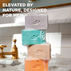 Dove Men+Care cleansing bar natural essential oils close-up highlighting fragrance.