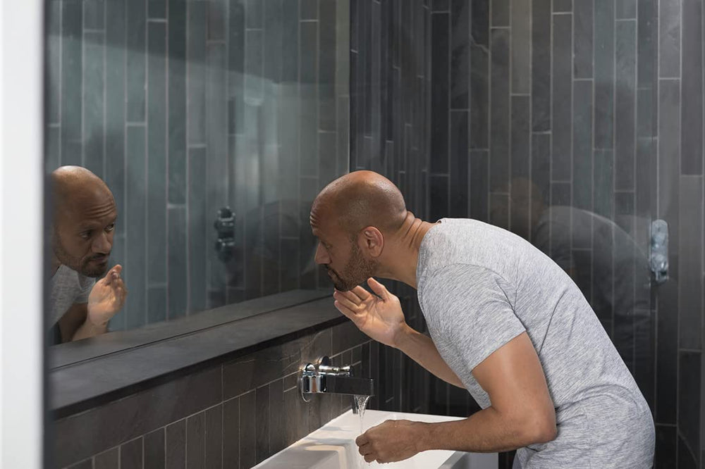 Dove Men+Care Hydrate Face Wash boxed set on shelf conveys approachable grooming option.