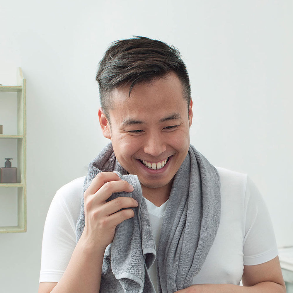 Dove Men+Care Hydrate Face Wash on sink setting suggests everyday morning routine.