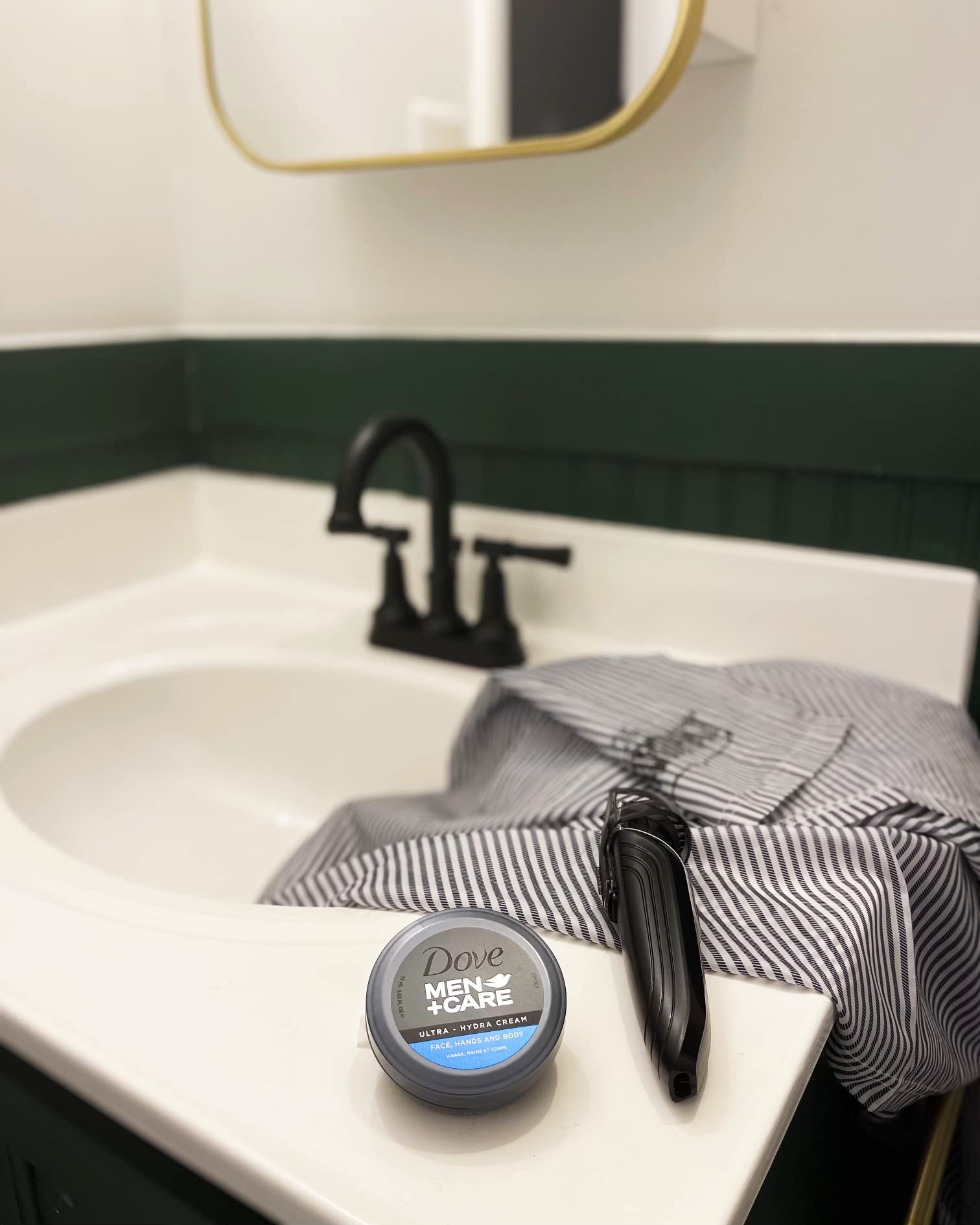 Hands and body application of Dove Ultra Hydra Cream for moisture