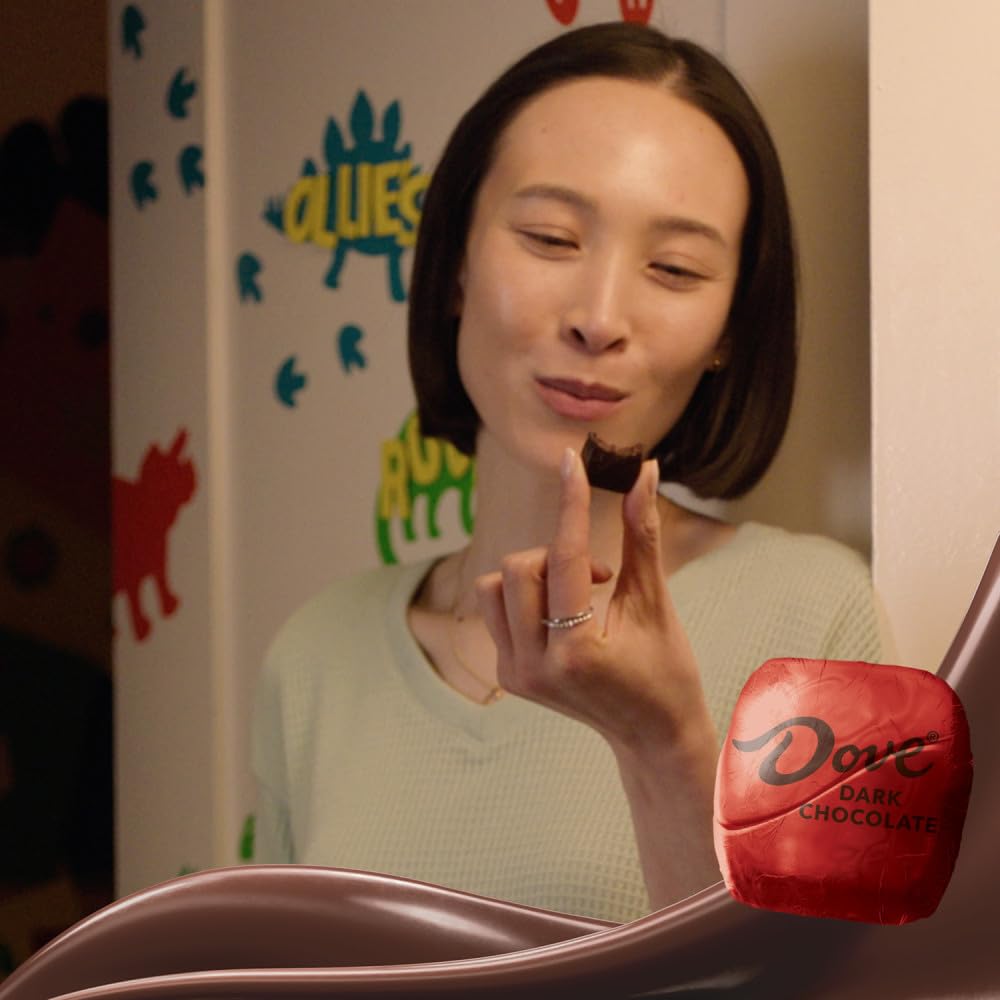 Dove Promises dark chocolate on a movie night tray for self-care moments.