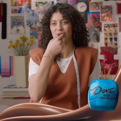 Dove Promises resealable bag opened, keeping chocolate fresh between indulgences.