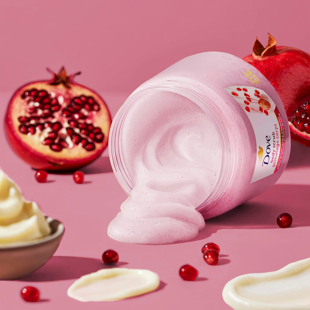 Rinsing Dove scrub away to reveal smoother skin.
