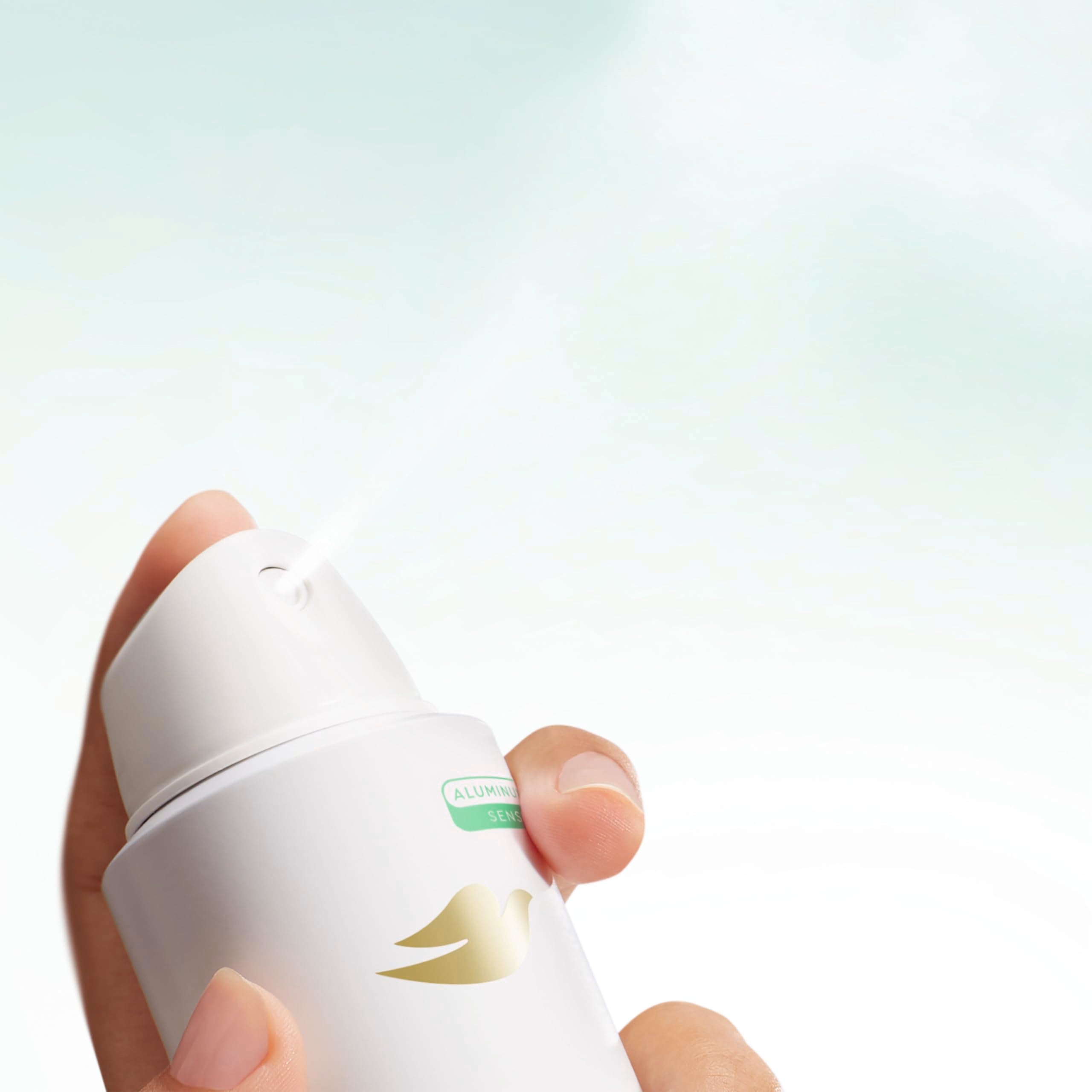 Dove deodorant spray packaging shows dermatologist-tested and aluminum-free protection.