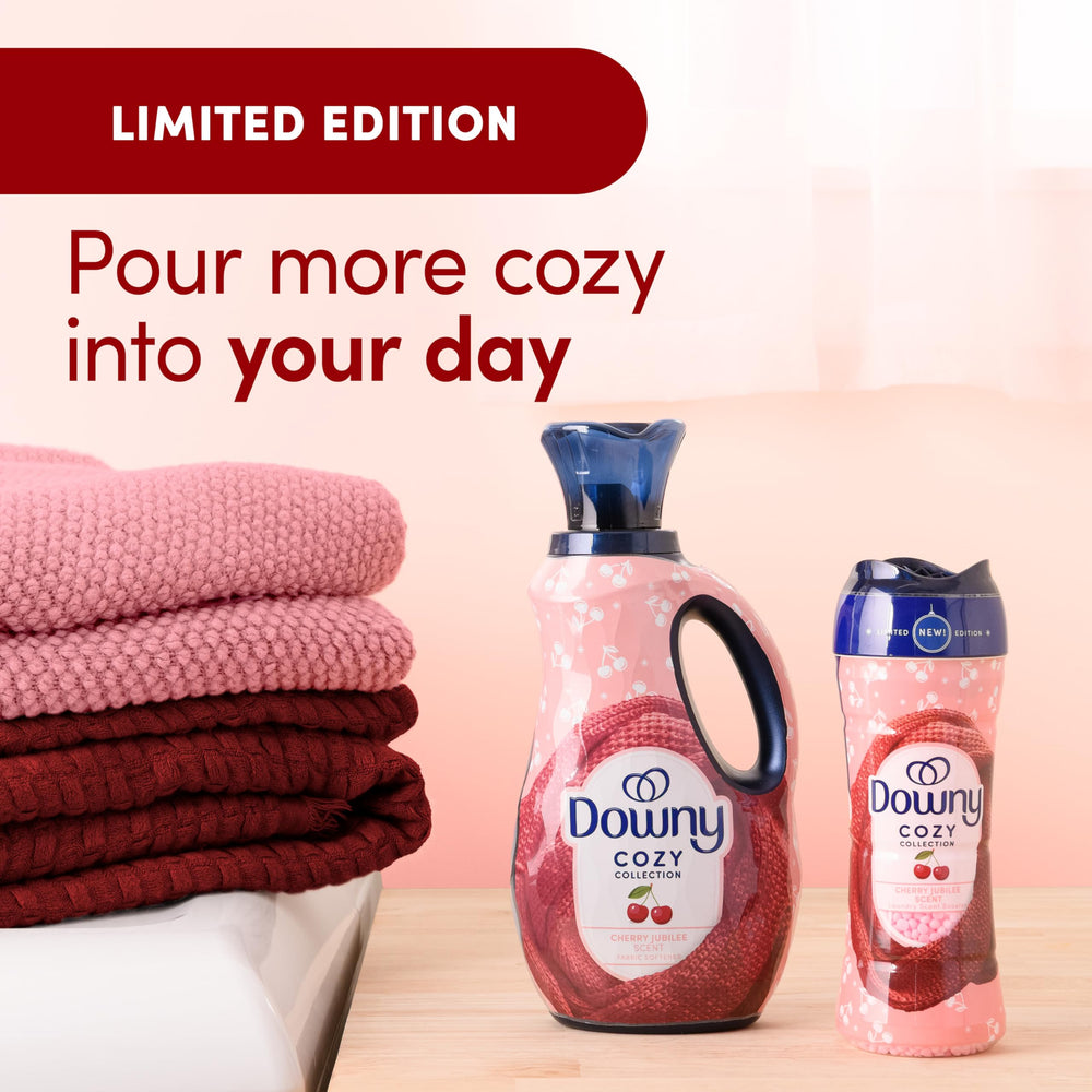 Downy Cozy Collection beads in washer illustrating in-wash fragrance.