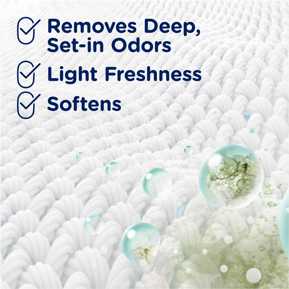 Downy Rinse beside baby clothes indicating skin-friendly formula.