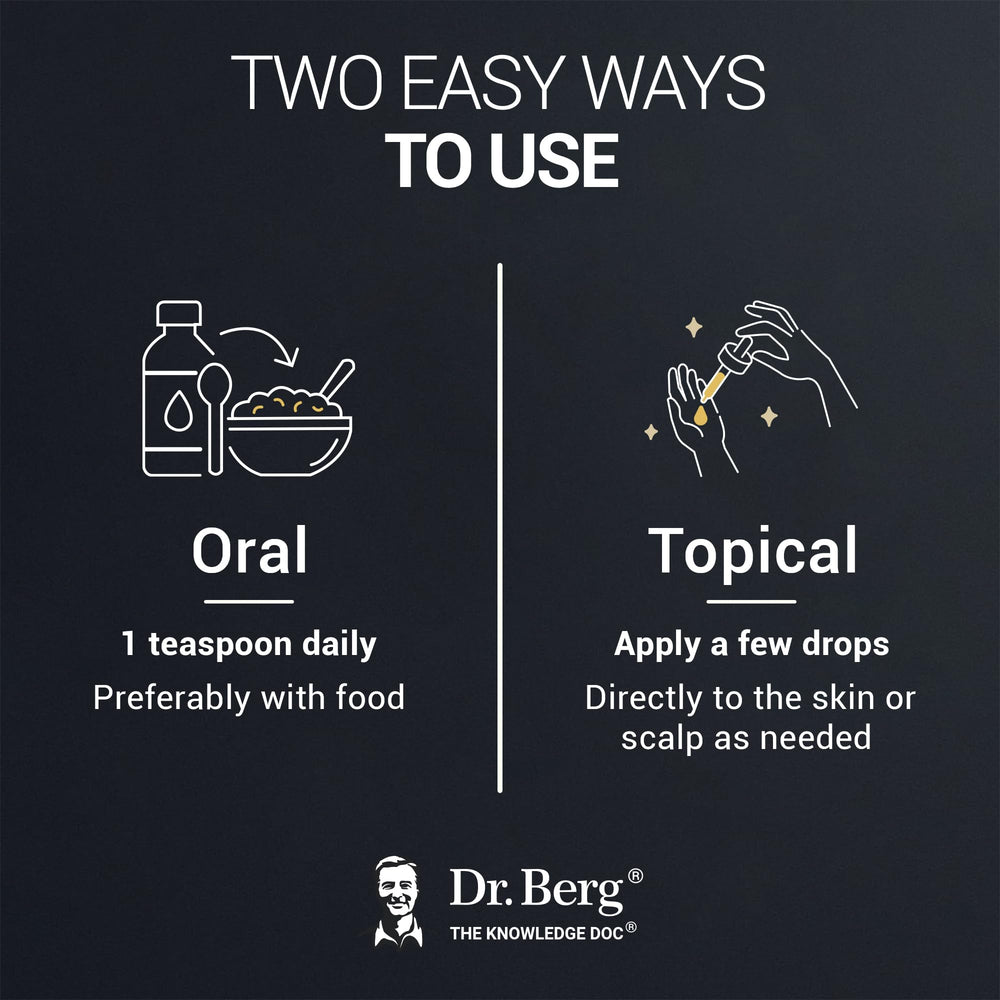 Hands holding Dr. Berg Black Seed Oil bottle ready for daily routine.