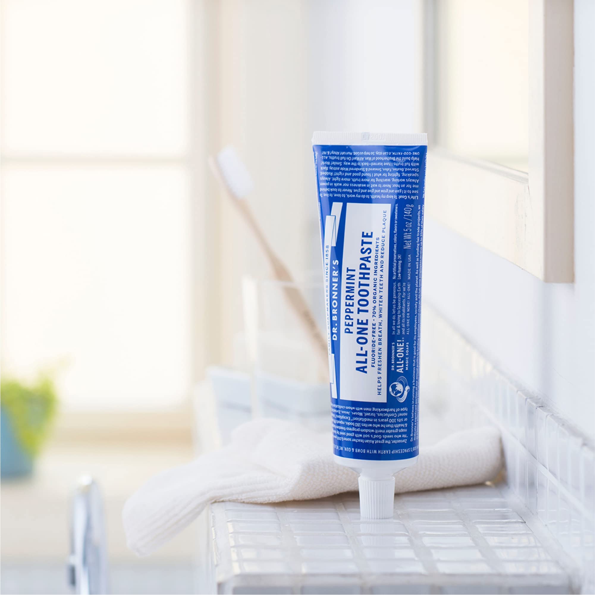 Close-up of toothpaste texture showing hydrated silica and calcium carbonate polishing action.