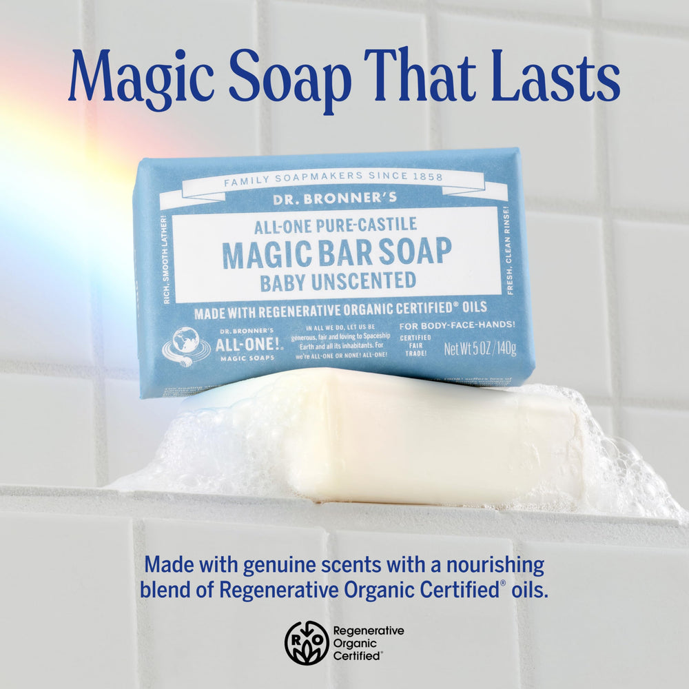 Dr. Bronner's Baby Unscented bar soap in use for body and face cleansing.