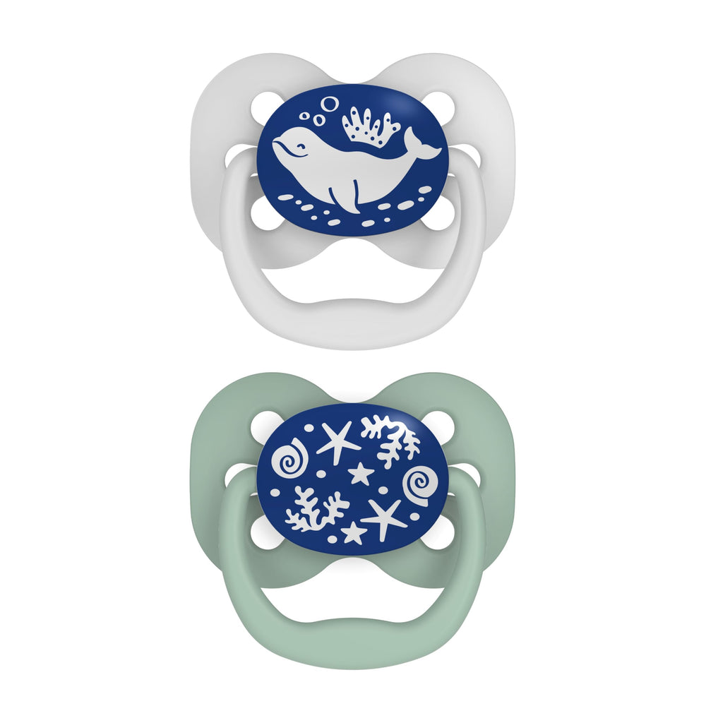 Dr. Brown's Advantage reversible pacifier for easy mouth placement.