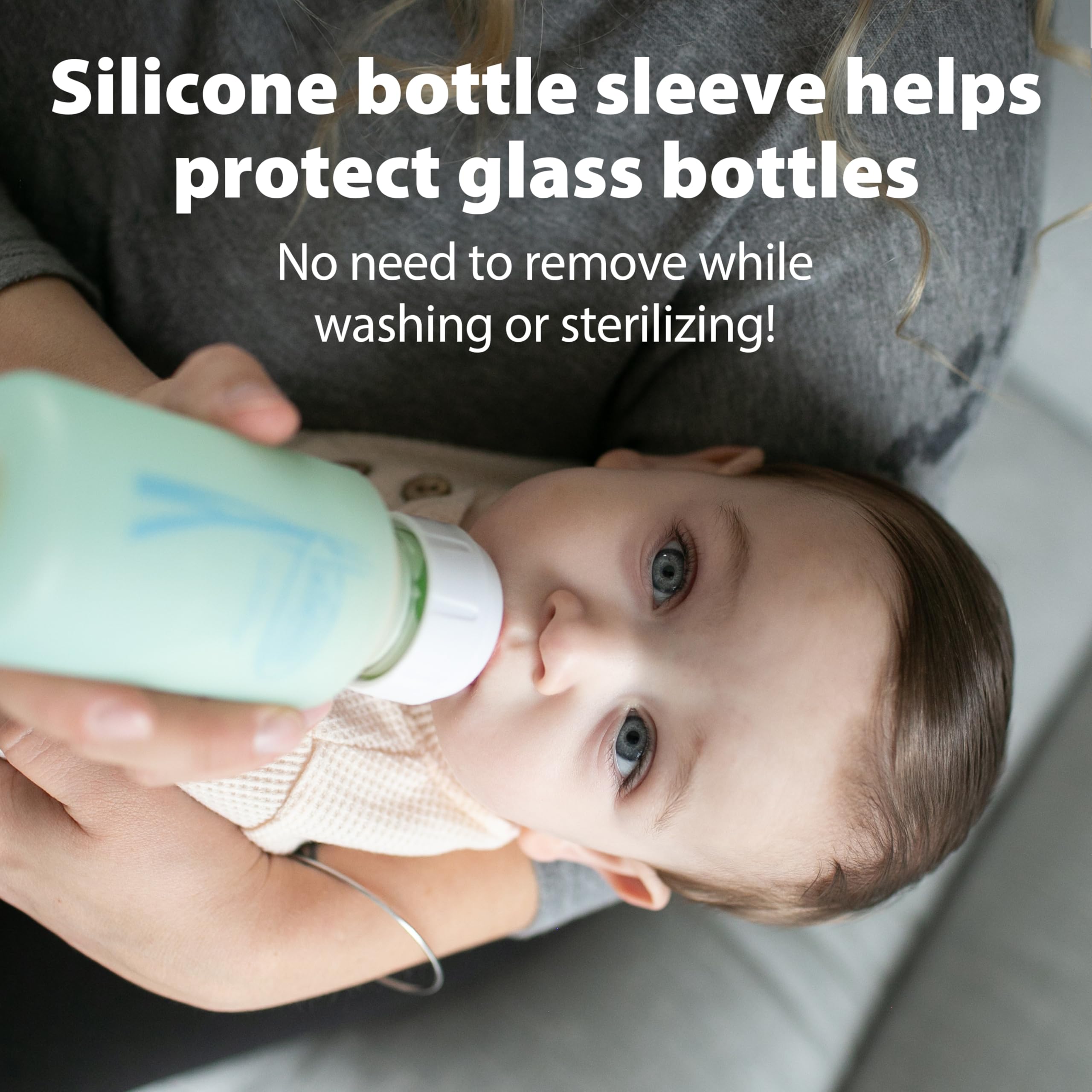 Dr. Brown's bottle beside a breast during transition for natural feeding
