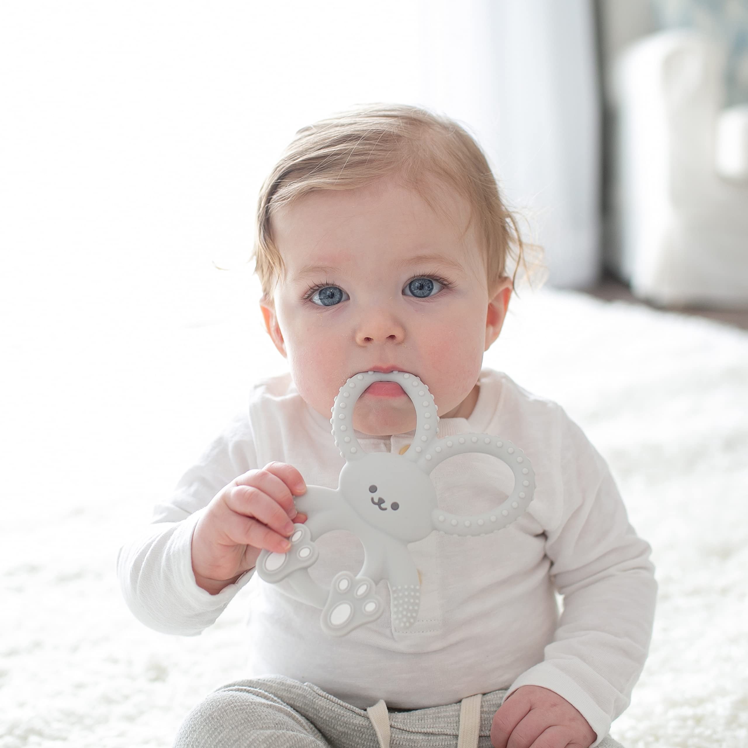 Dr. Brown's Flexees Bunny Teether flexible ears reach molars and hard-to-reach areas.
