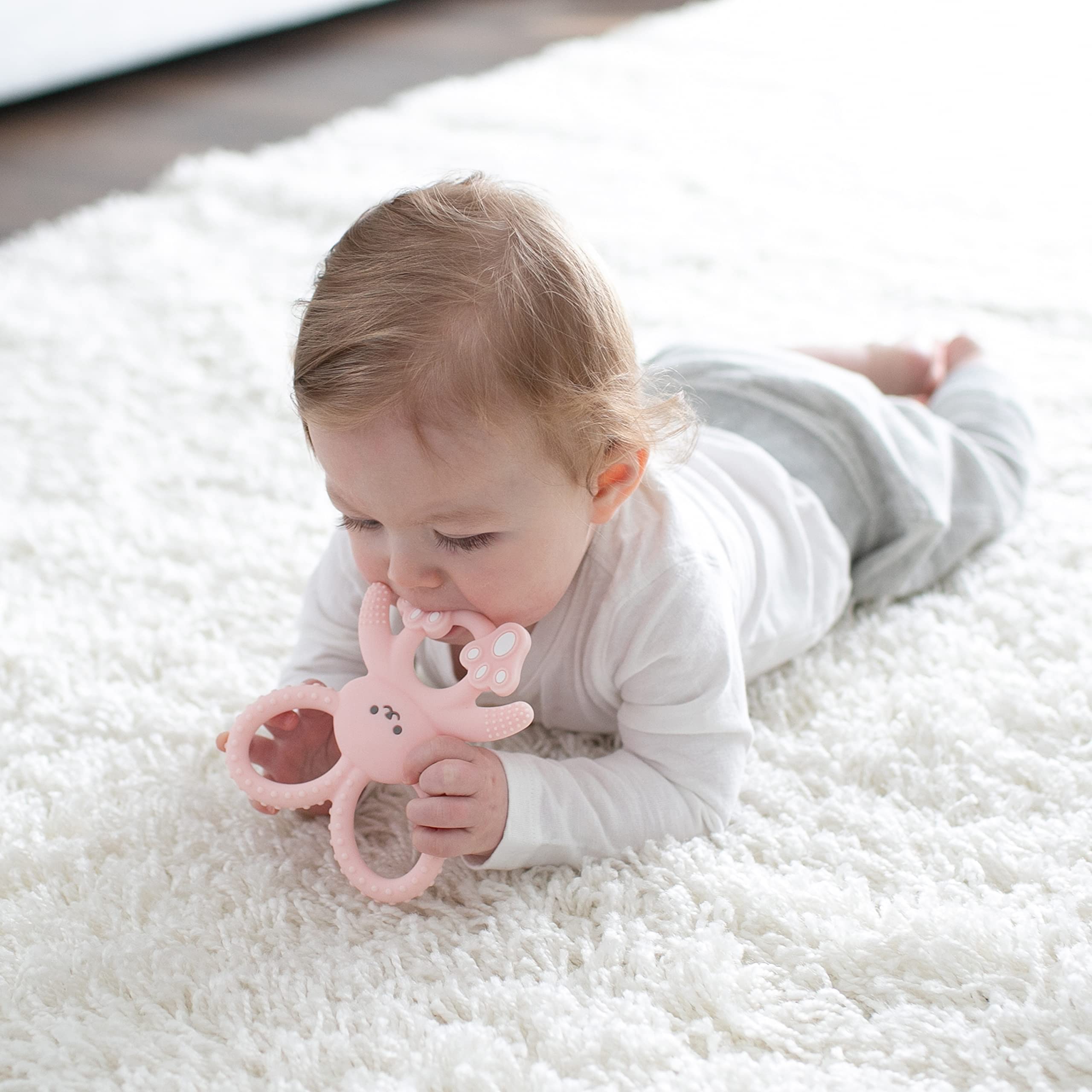 Dr. Brown's Flexees Bunny Teether textured arms aid gum massage.
