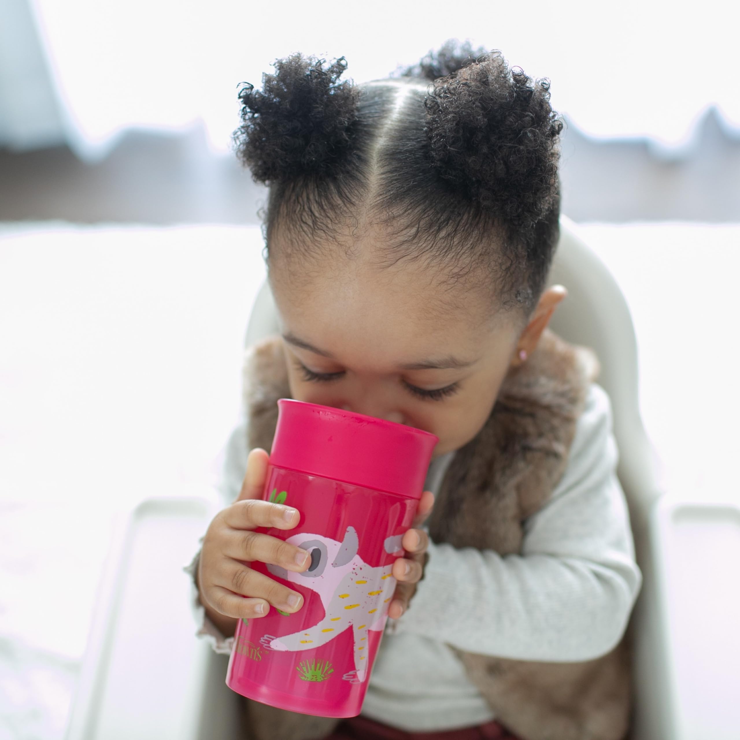 Dr. Brown's Milestones Cheers360 travel lid keeps cups sealed on the go.