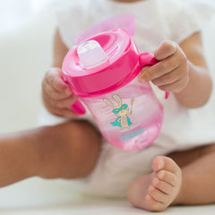 Dr. Brown's Milestones cup with locked handles for a secure grip.