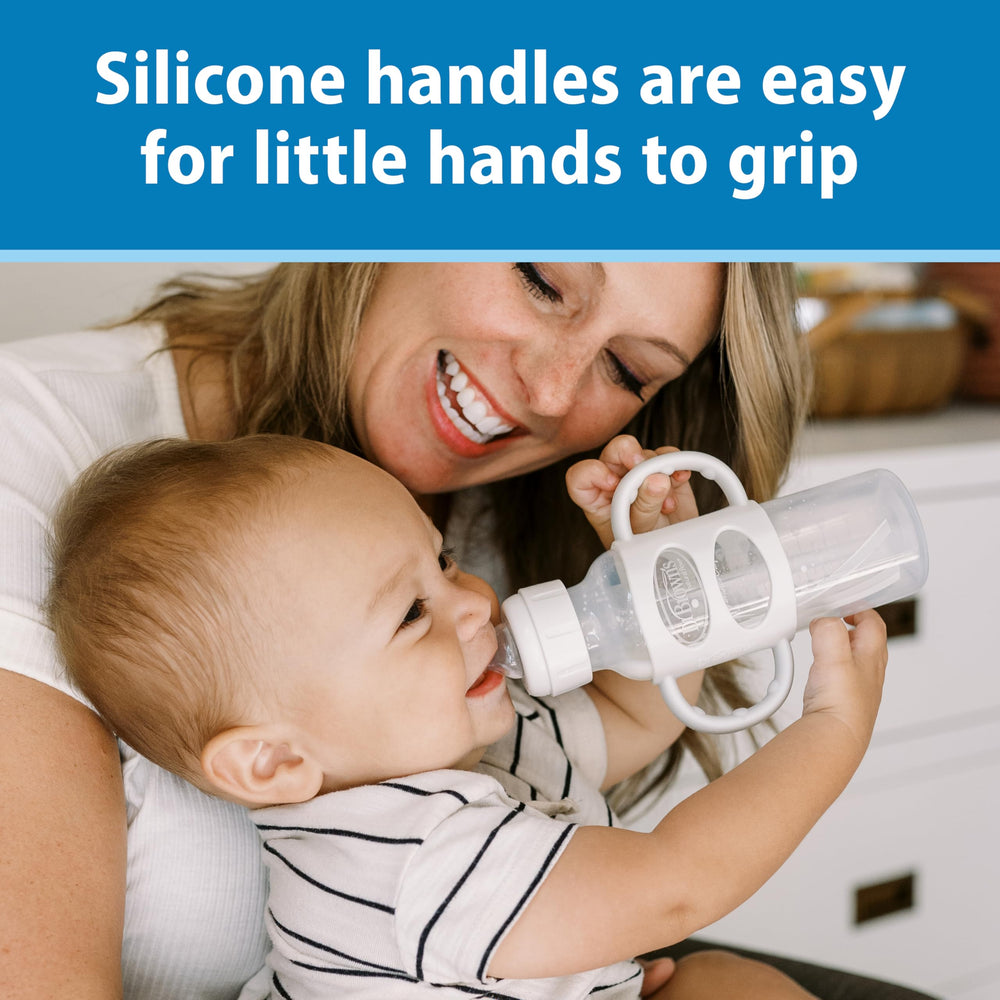 Removable 100% silicone handles provide easy grip on Dr. Brown's Milestones bottle.