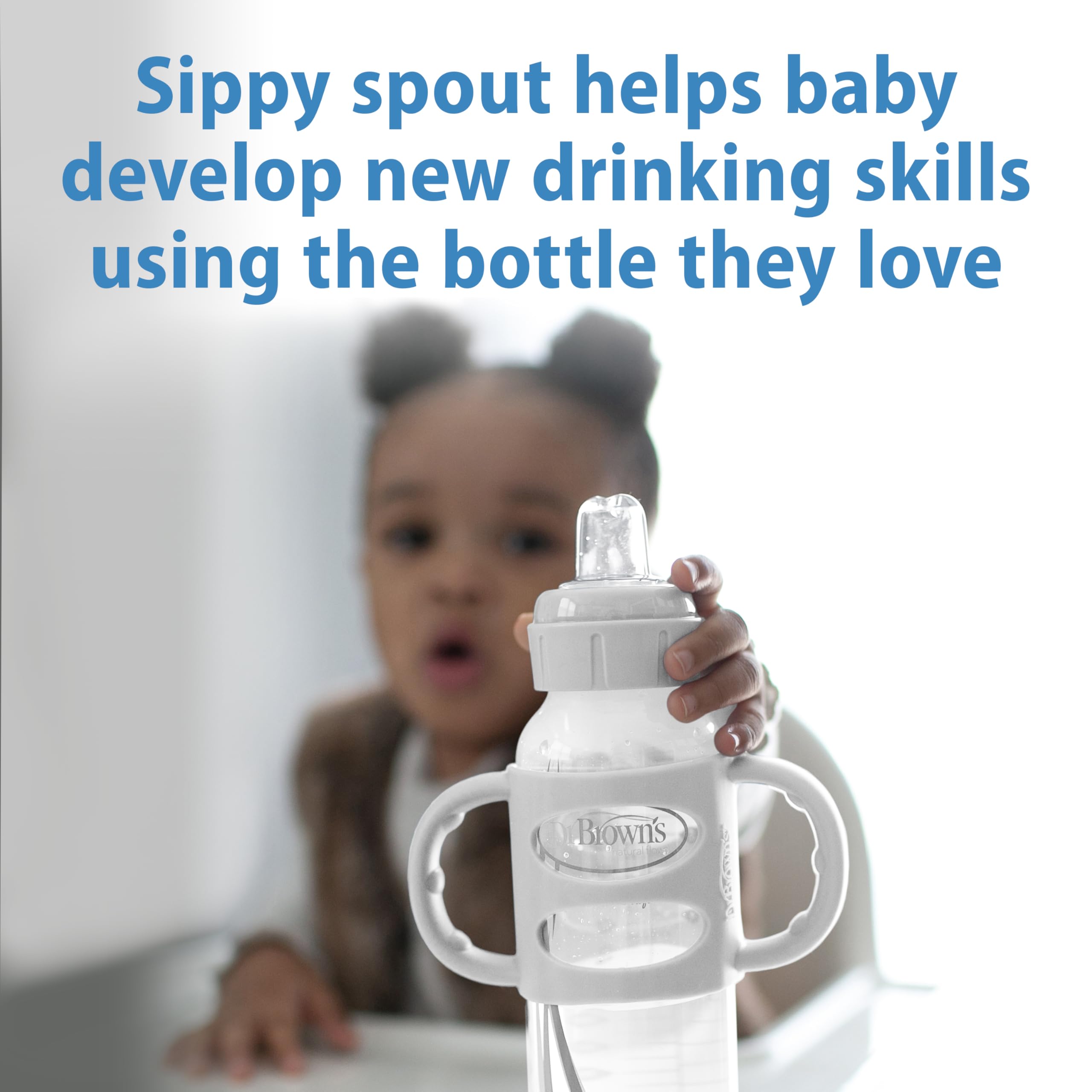 Close-up of Dr. Brown's Milestones soft silicone sippy spout for gentle transitions.