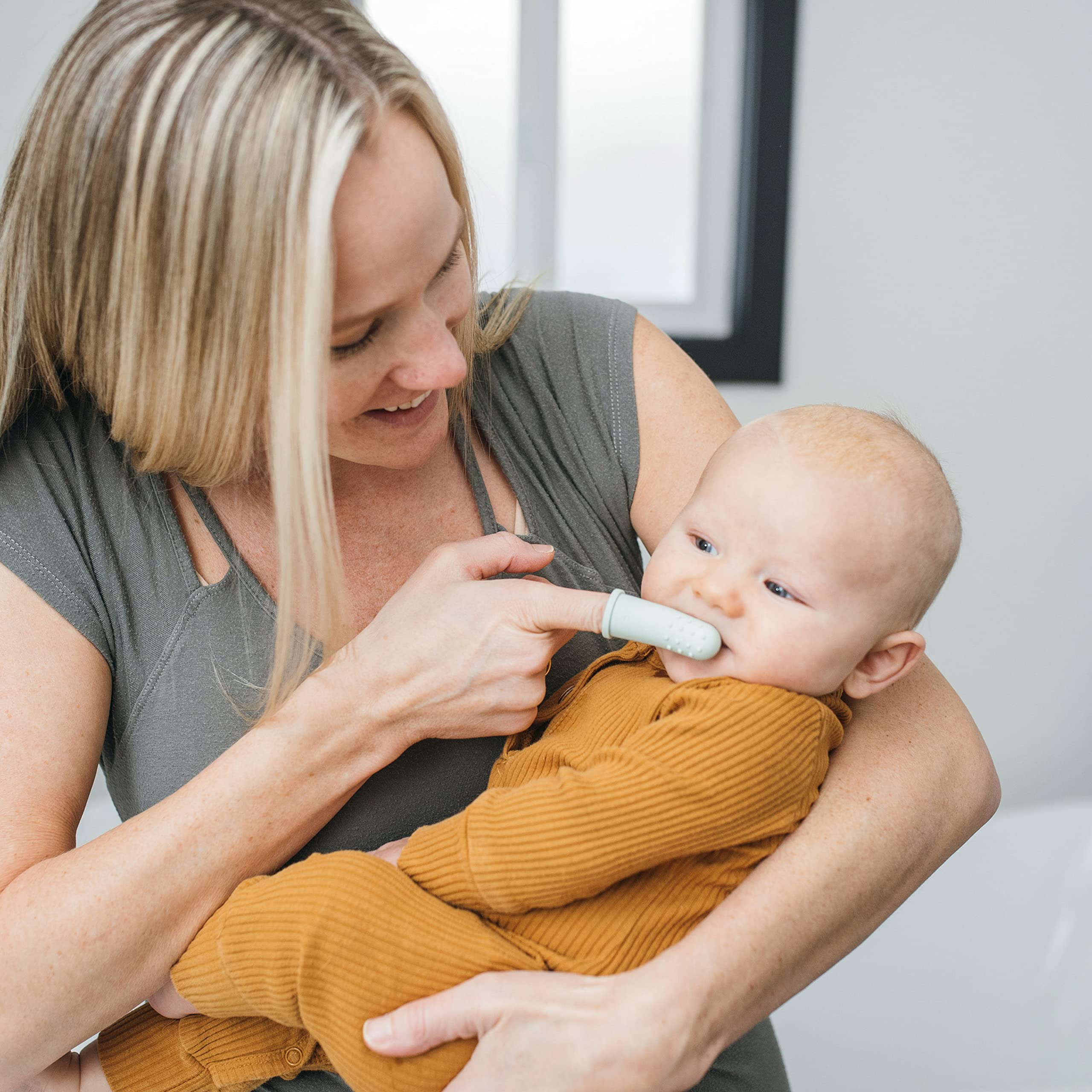 Dr. Brown's textured surface massages cheeks for teething.