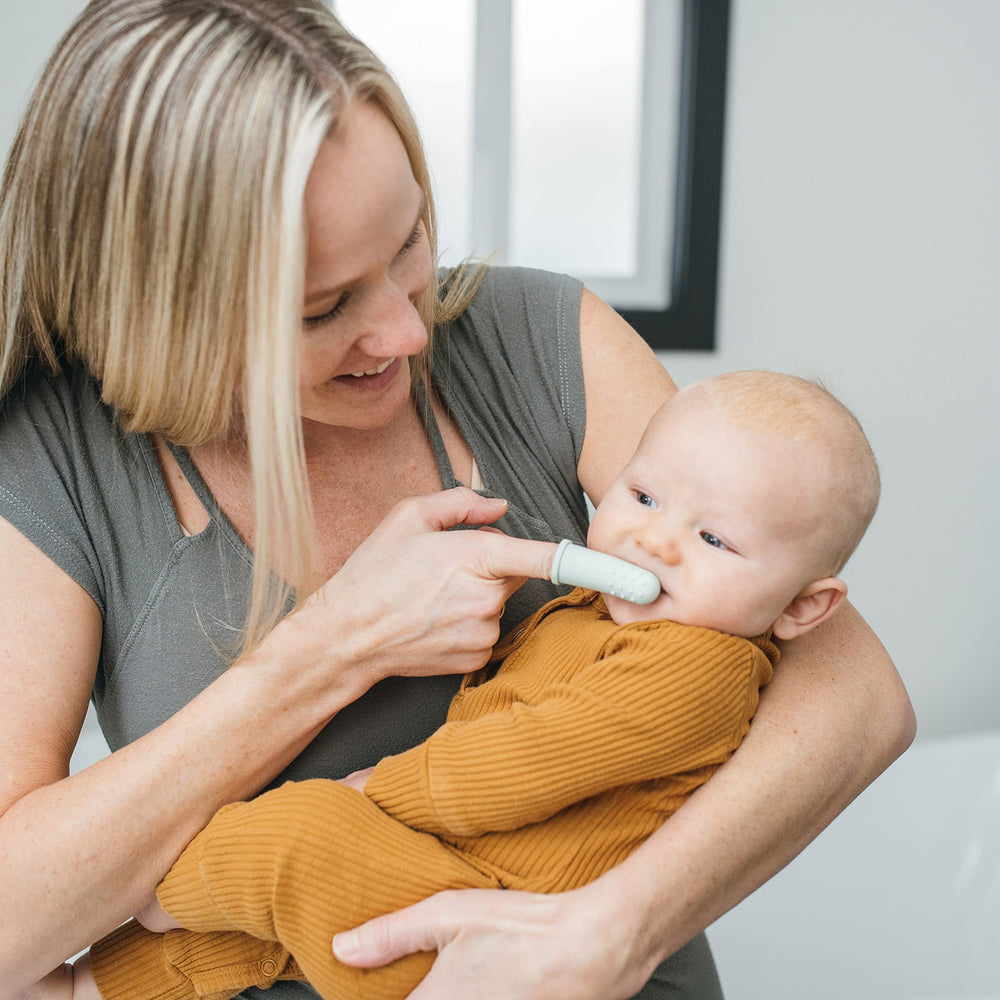 Dr. Brown's textured surface massages cheeks for teething.