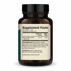 Closeup of Dr. Mercola Niacinamide 50mg mini-tab tablet for compact dosing