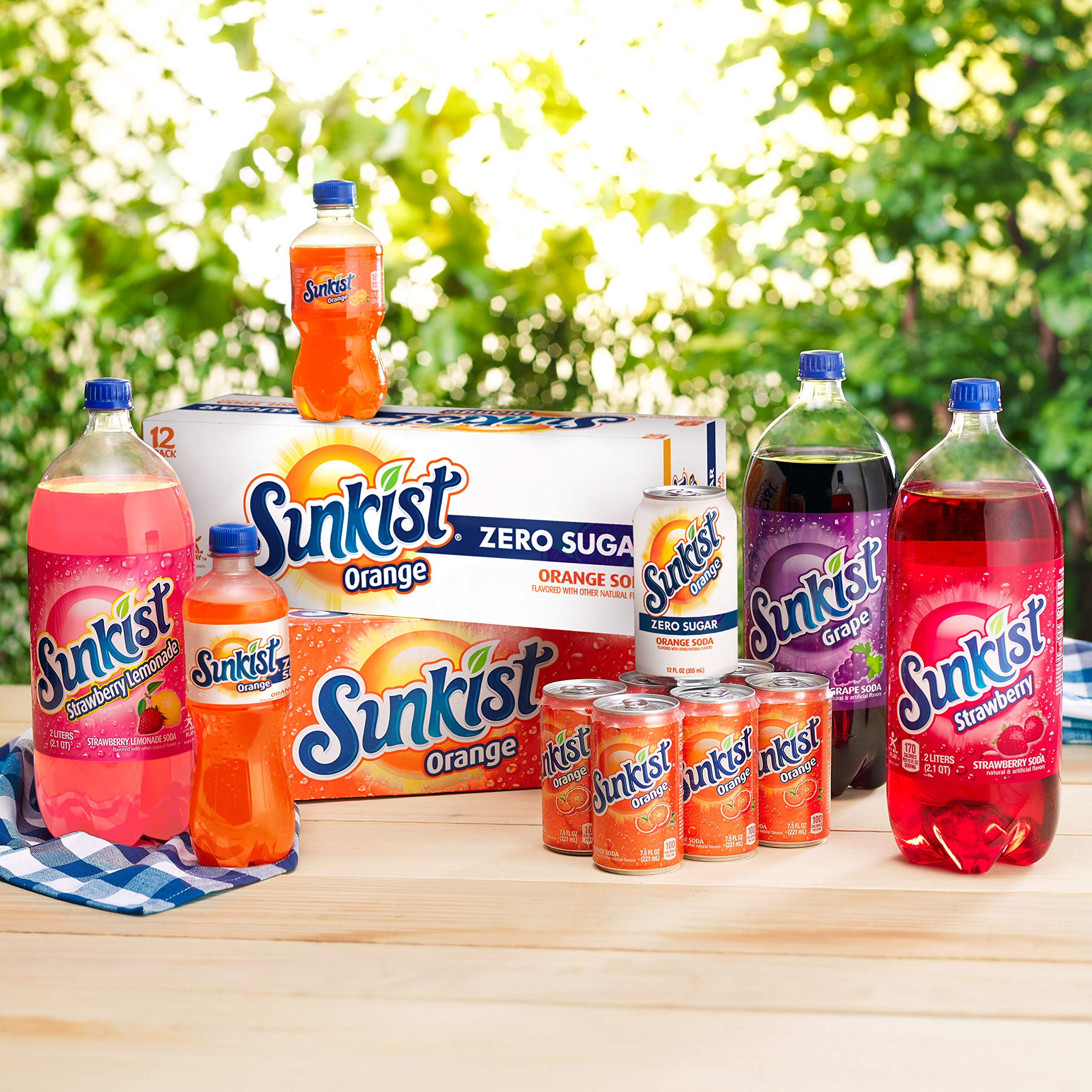 Dr Pepper Sunkist Zero Sugar orange soda in fridge display, cooling refreshment on demand.