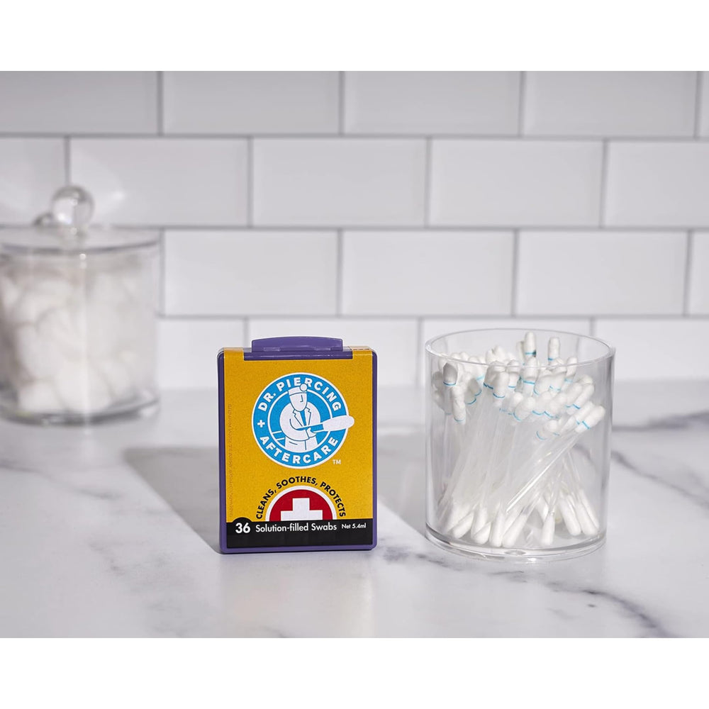 Ear piercing cleansing with Dr. Piercing Aftercare Swabs