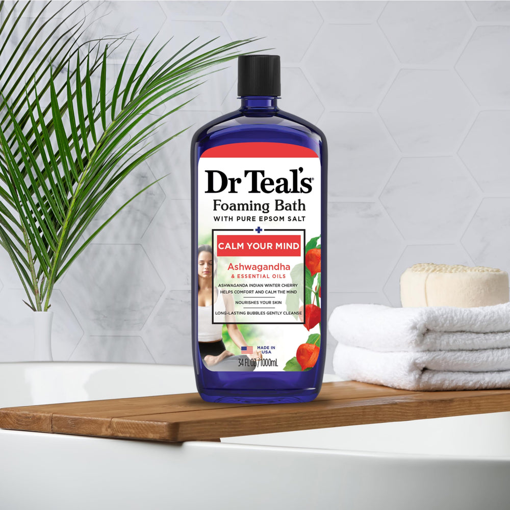 Dr Teal's Foaming Bath bottle label closeup highlights natural ingredients.
