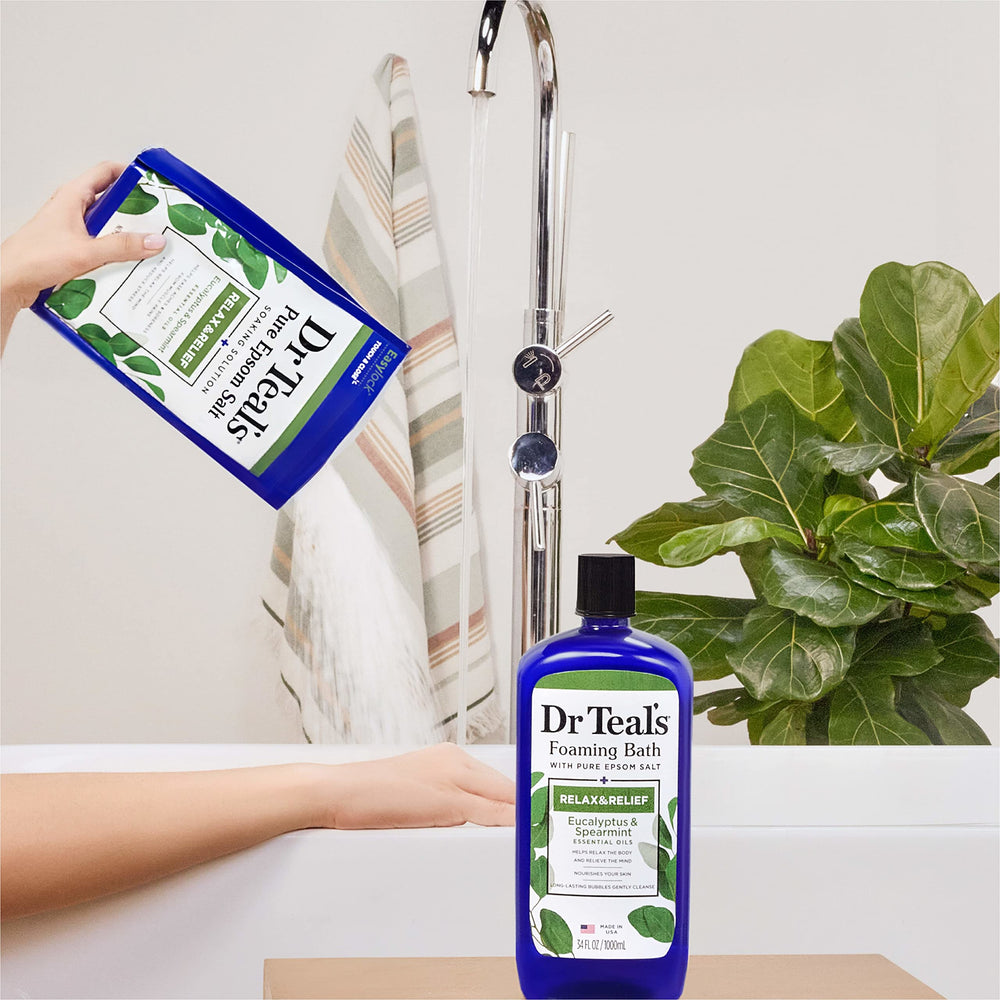 Dissolving Dr Teal's salt in warm bath water for a soothing ritual