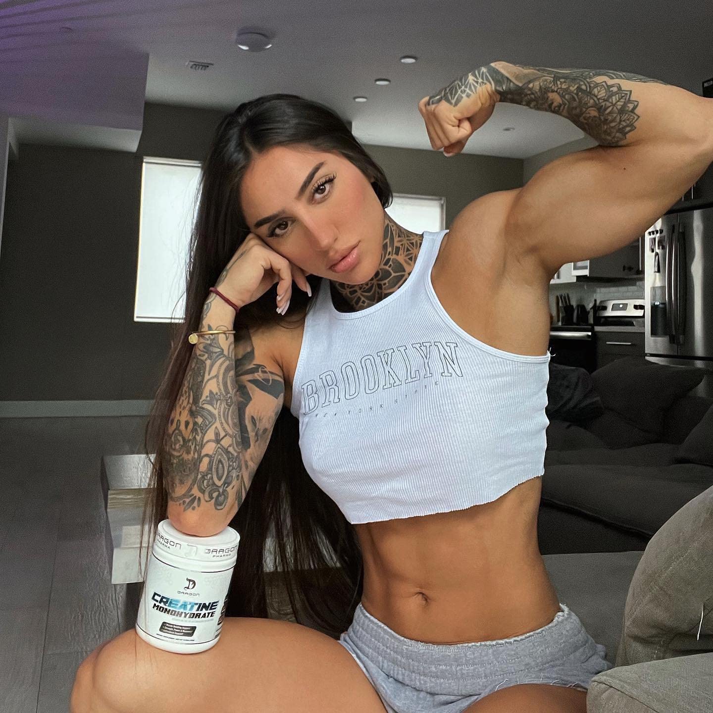 Dragon Pharma Creatine Monohydrate in a shaker illustrates mixability and easy use.