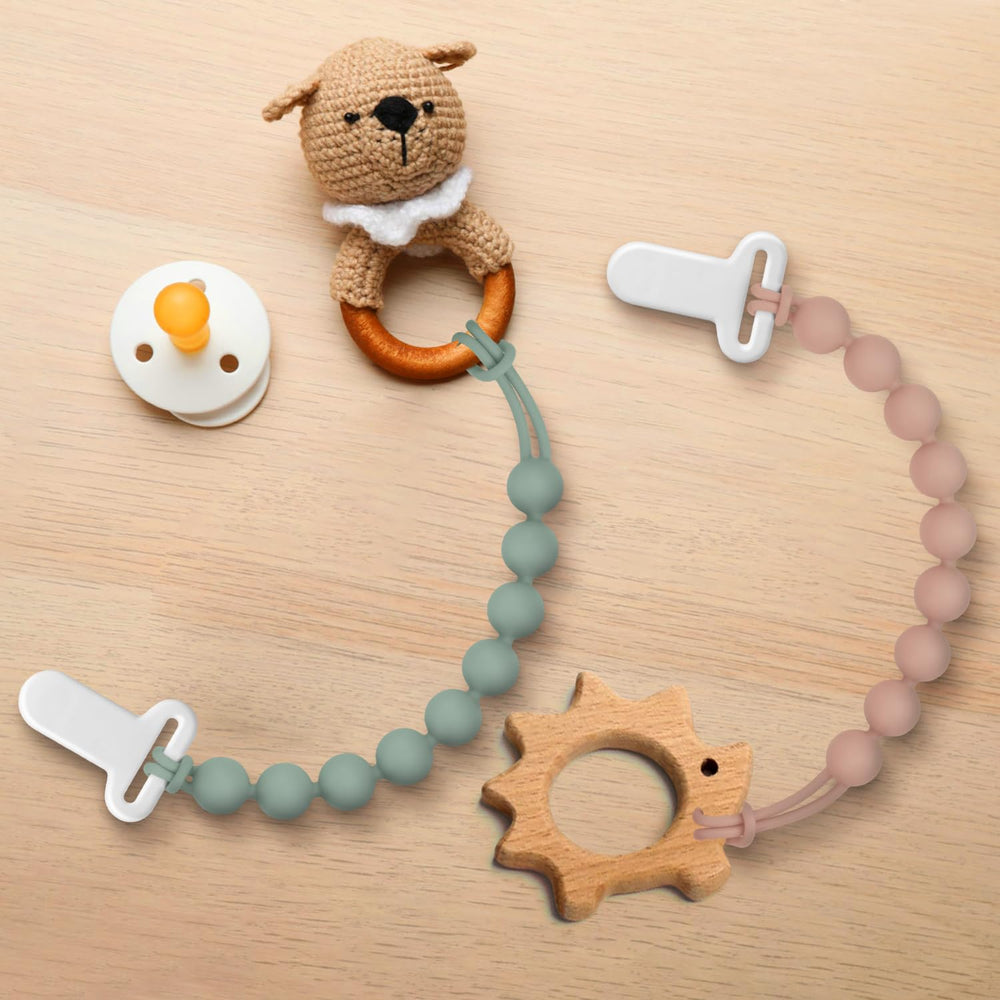 Draklary pacifier clip shown in car travel setup for on-the-go use.