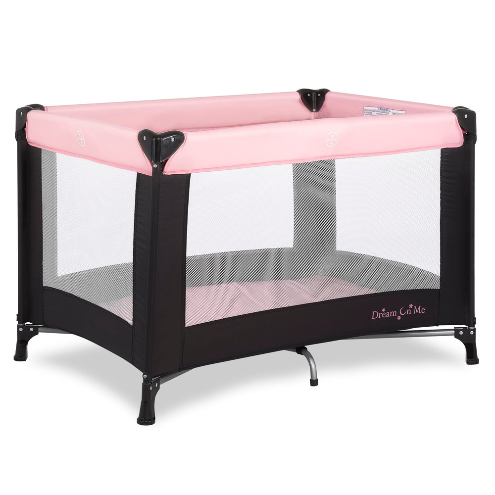 Dream On Me Nest portable playard setup demonstrates quick assembly for travel.