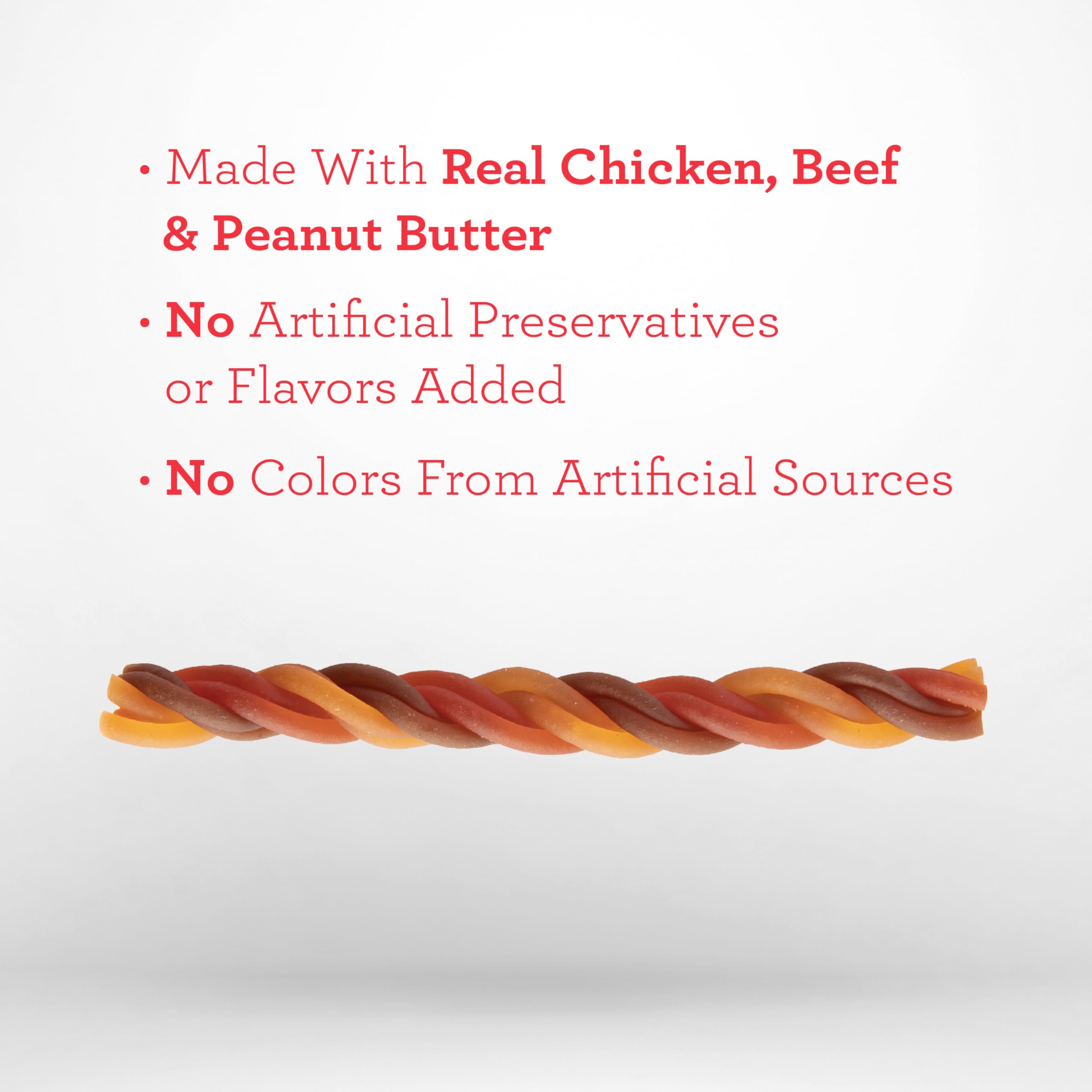 DreamBone dog chew closeup — real chicken, beef and peanut butter flavor mix.