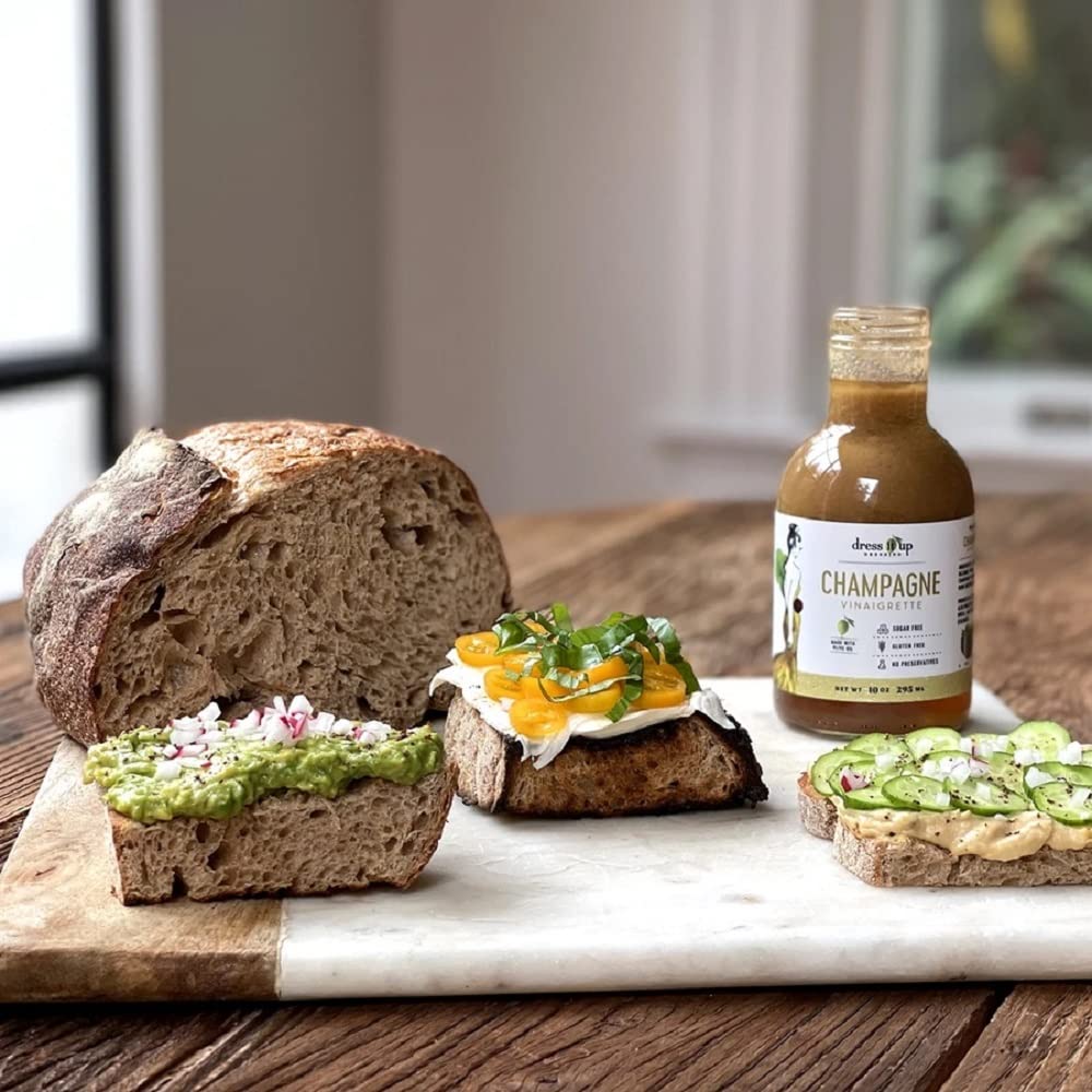 Dress It Up Champagne Vinaigrette bottle on kitchen counter with premium flavor