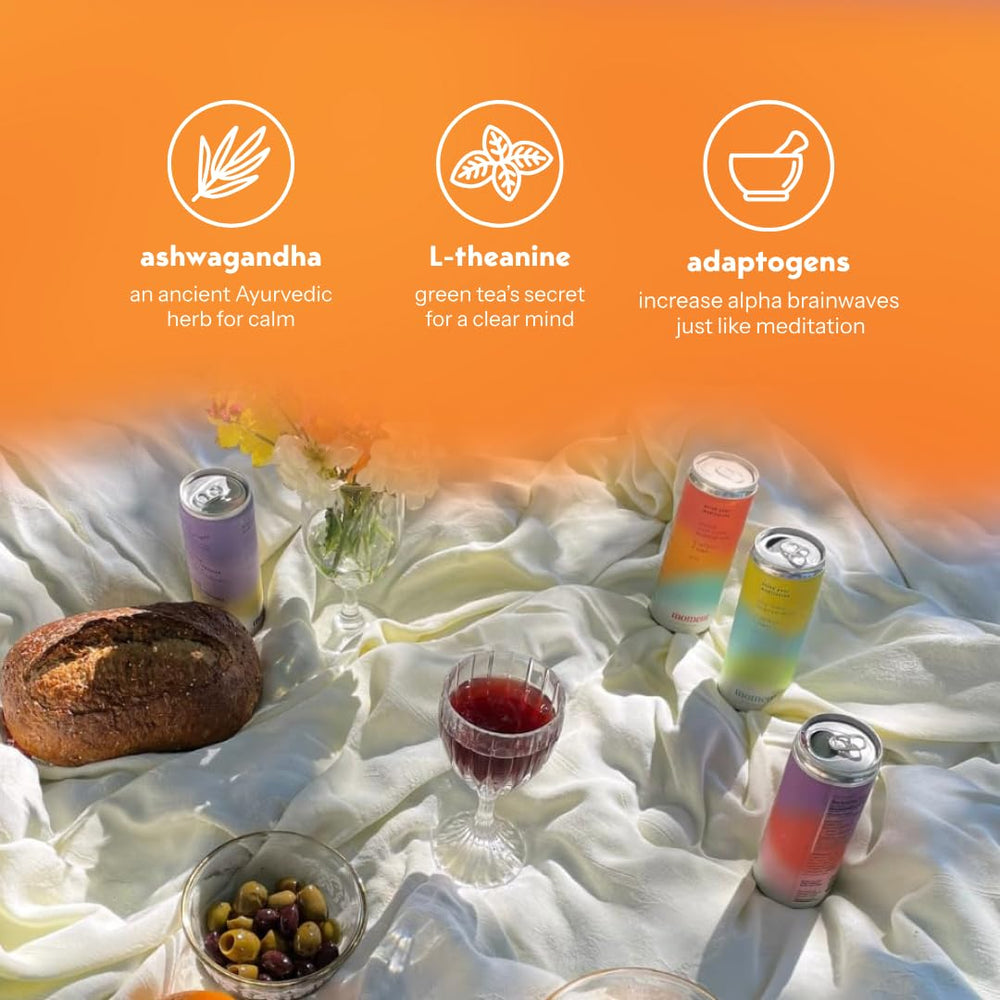 Moment Adaptogen Drink bottle on counter suggests zero caffeine and alcohol for mindful sipping.