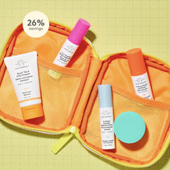 Drunk Elephant Littles Kit bottles laid out for cleansing, exfoliating, and hydrating
