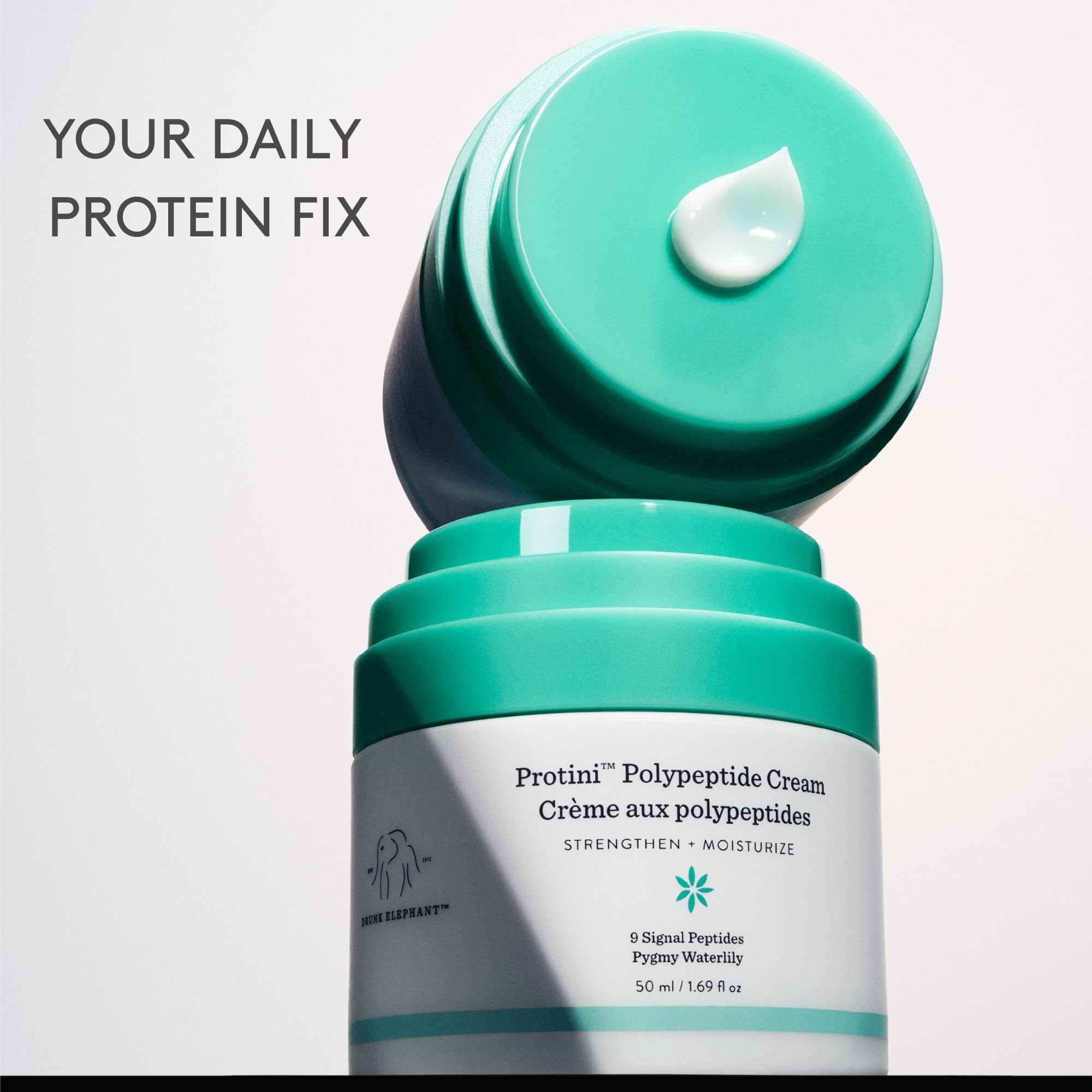 Dermatologist-tested label on Protini Cream packaging.
