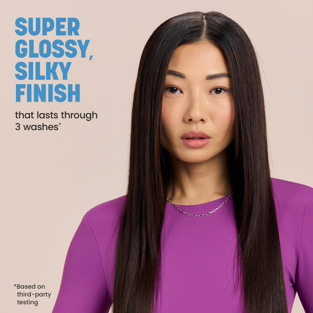 Drybar Liquid Glass on dry hair after blowout, delivering a sleek, weightless feel.