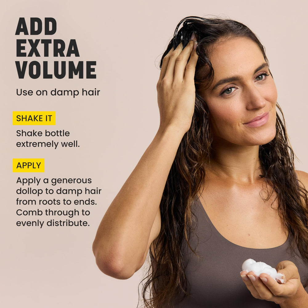 Drybar Southern Belle Volume Boosting Mousse shine-glow on styled strands.