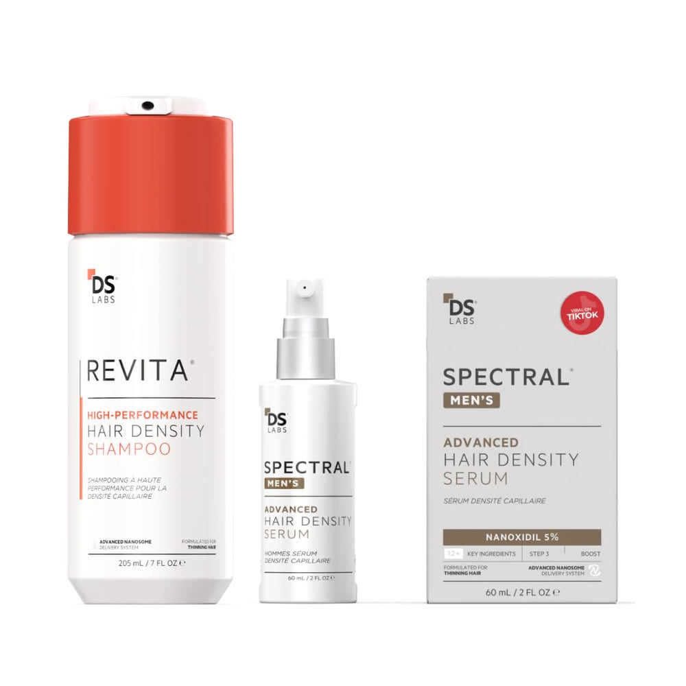 DS Laboratories Revita Shampoo bottle close-up showing scalp cleansing action for refreshed roots.