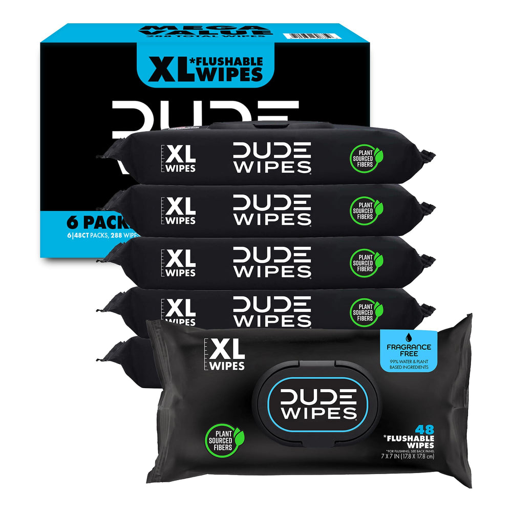 DUDE Wipes extra-large dispenser on bathroom counter for quick refreshment.