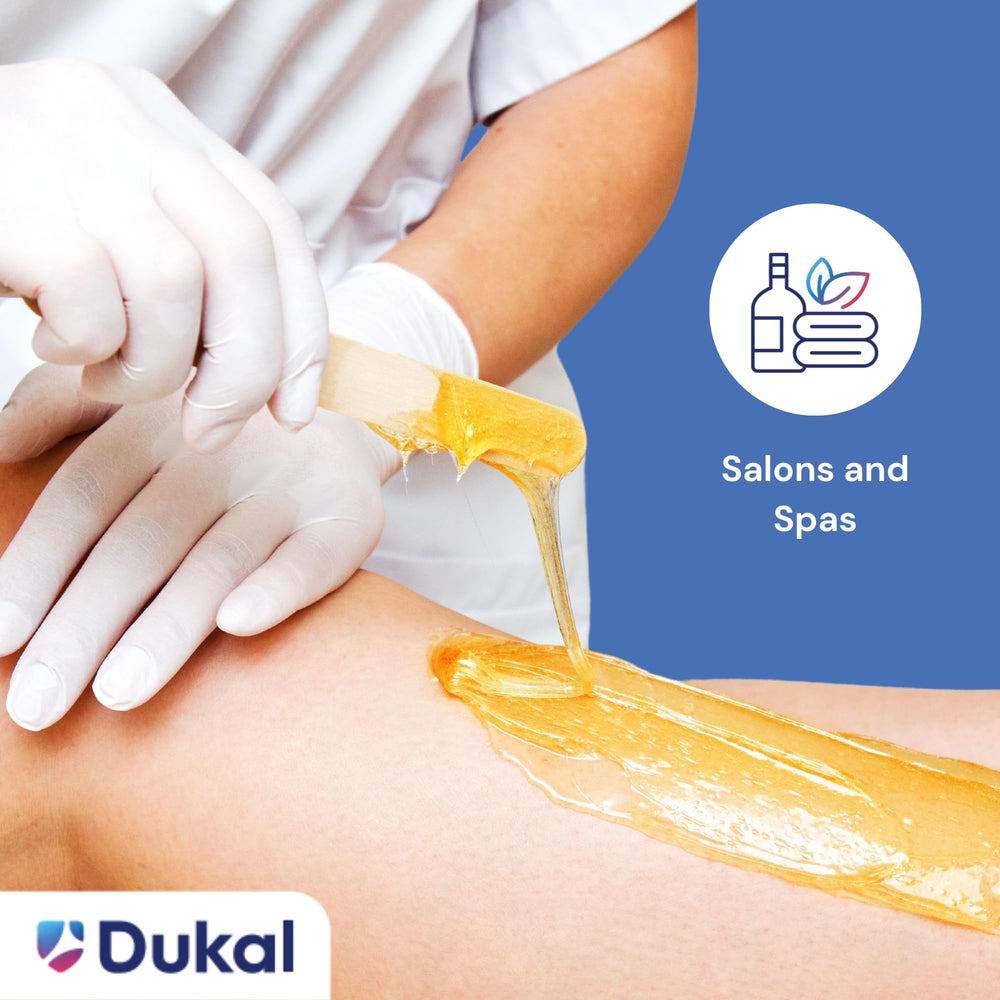 Dukal wooden wax stick in a salon setting for larger surfaces.