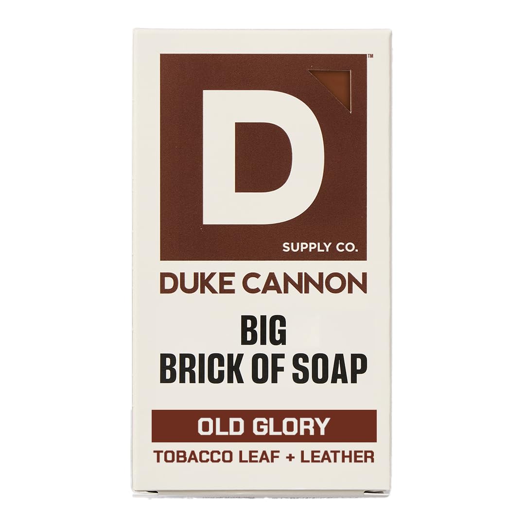Duke Cannon Old Glory soap bar with leather and tobacco scent for long-lasting cleansing.